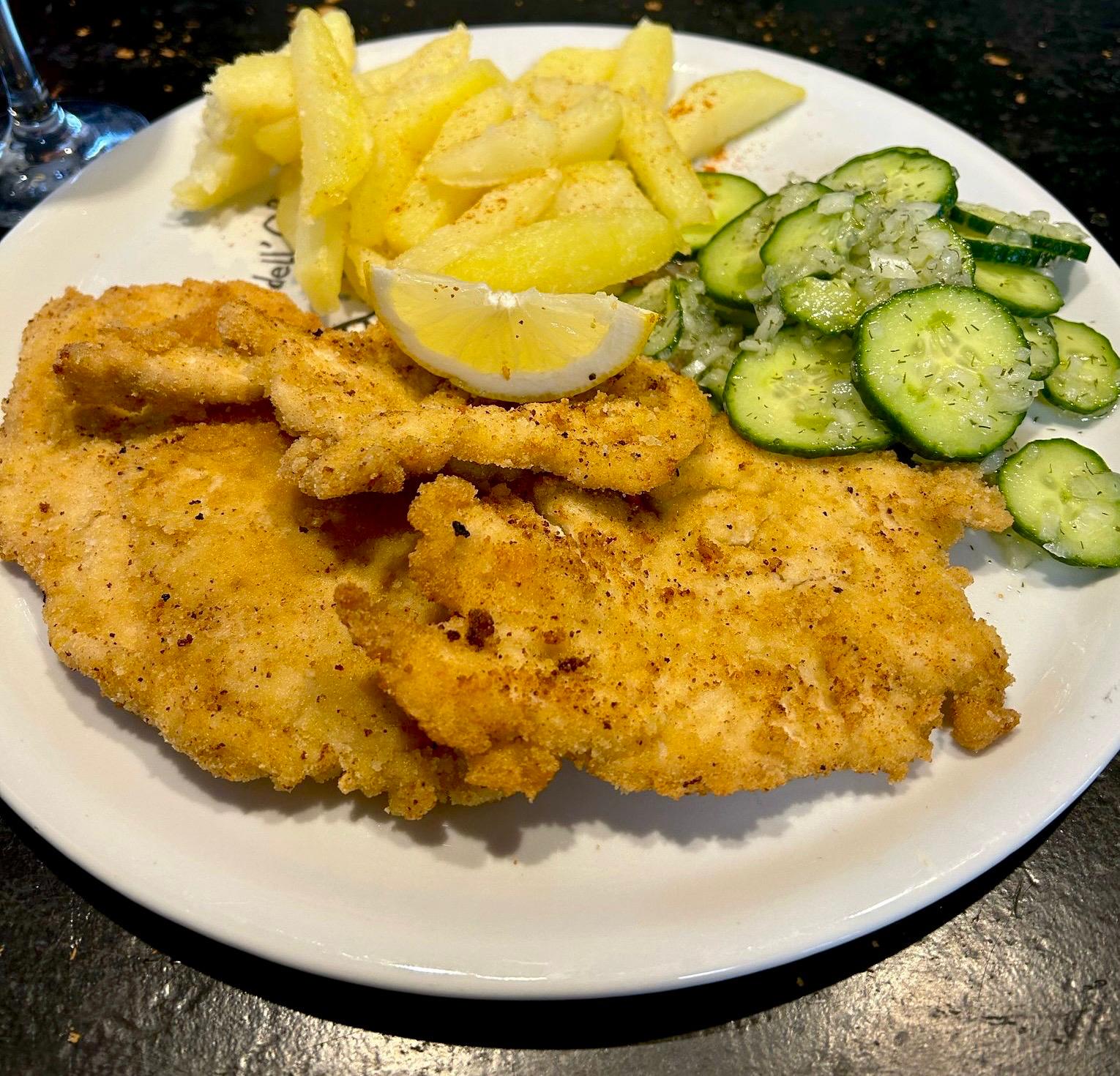 Schnitzels with Homemade Chips and Cucumber Salad
